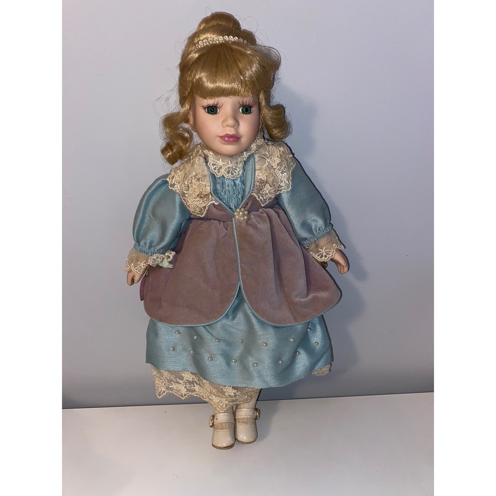 Brass Key‎ Porcelain Doll